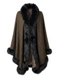 A brown herringbone-patterned cape coat with a large black faux fur collar, front trim, and hem, shown on a checkered transparency background.