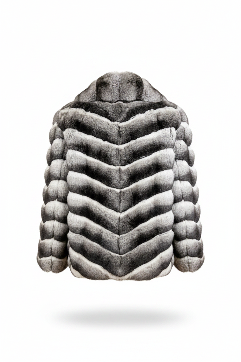 A cropped fur jacket with a high padded collar, featuring a bold chevron pattern of alternating dark gray and light gray horizontal rows, shown against a plain white background.