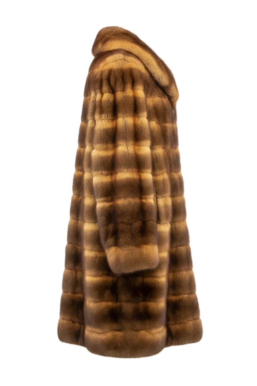 A long brown fur coat with horizontal striped pattern in shades of brown and tan, shown from the side against a plain white background.
