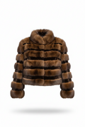 A brown striped fur jacket with a high collar and long sleeves, shown against a plain white background with a soft drop shadow.