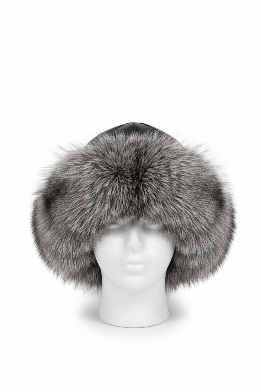 A gray and silver faux fur ushanka hat with ear flaps, displayed on a white mannequin head against a white background.