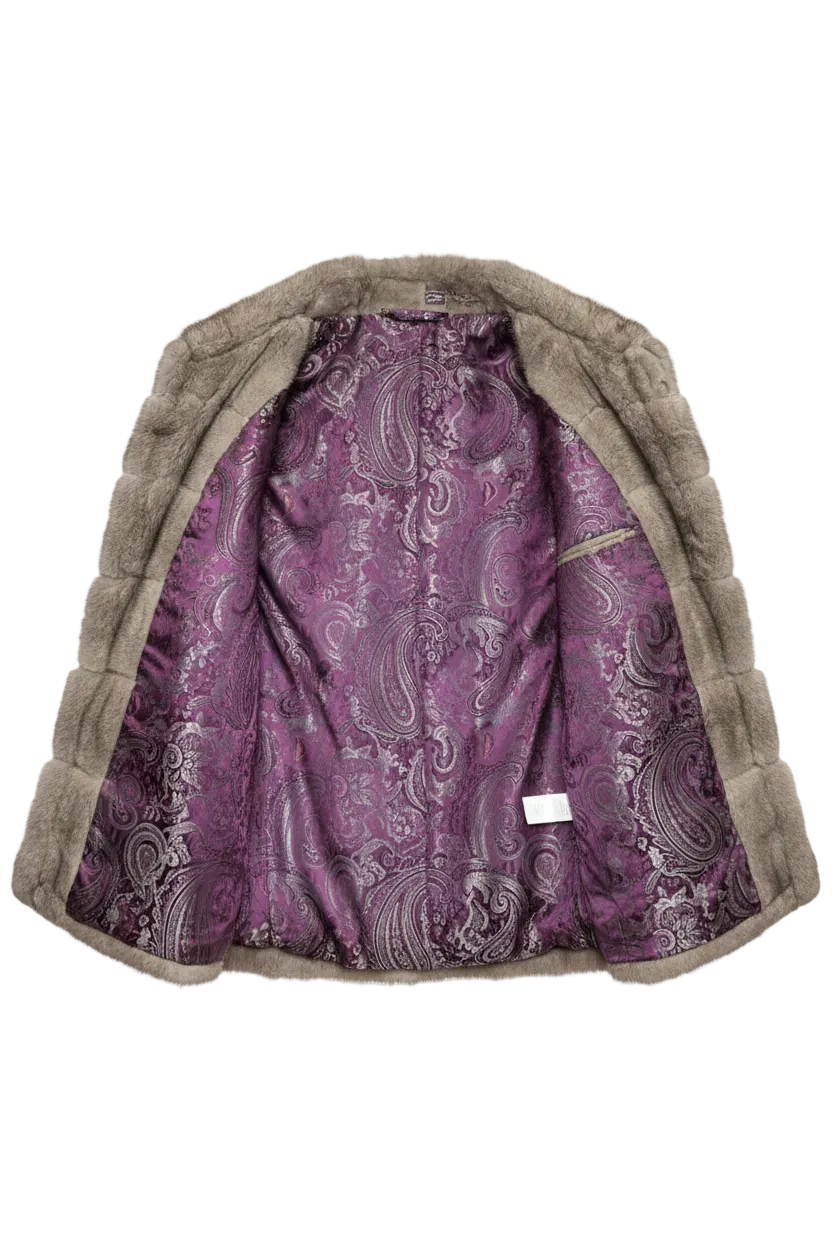 A cropped fur coat with a plush taupe-brown exterior and a purple paisley patterned lining, displayed open against a plain white background.