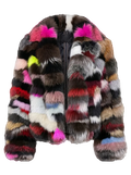 A multicolor patchwork fur jacket with vibrant blocks of pink, brown, black, white, red, and yellow, shown on a checkered transparency background.