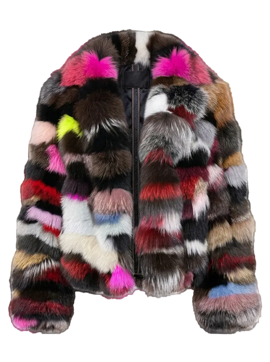 A multicolor patchwork fur jacket with vibrant blocks of pink, brown, black, white, red, and yellow, shown on a checkered transparency background.
