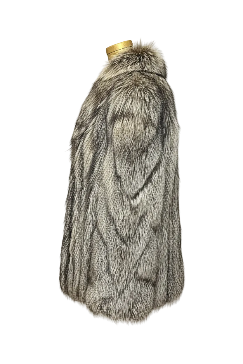 A long gray and silver faux fur coat with black stripes, displayed on a mannequin with a gold neck cap against a white background.