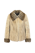 A beige mink fur jacket featuring a leopard print collar and matching leopard print cuffs, shown against a checkered transparency background.